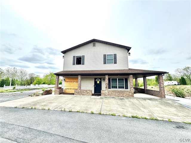 view of front of house with a carport