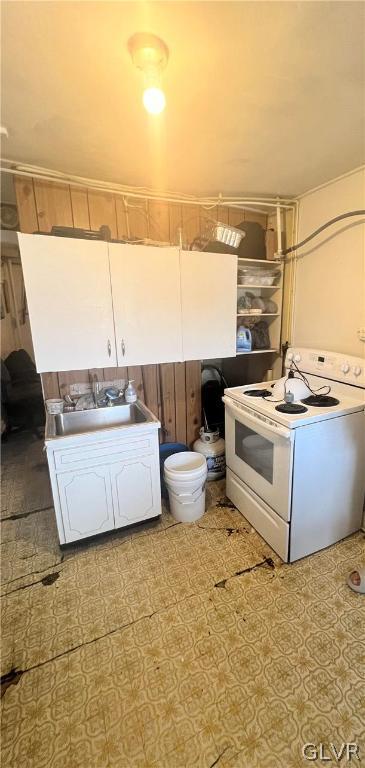 clothes washing area with sink