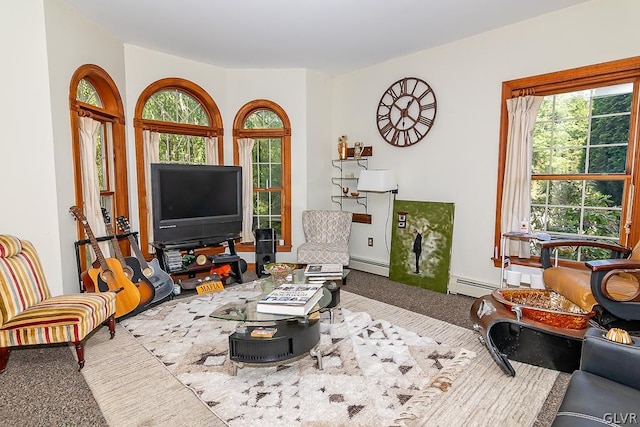 living room featuring carpet floors and a baseboard heating unit