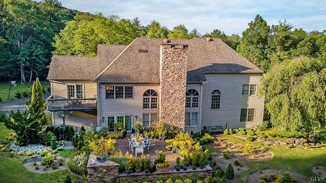 rear view of house featuring a patio