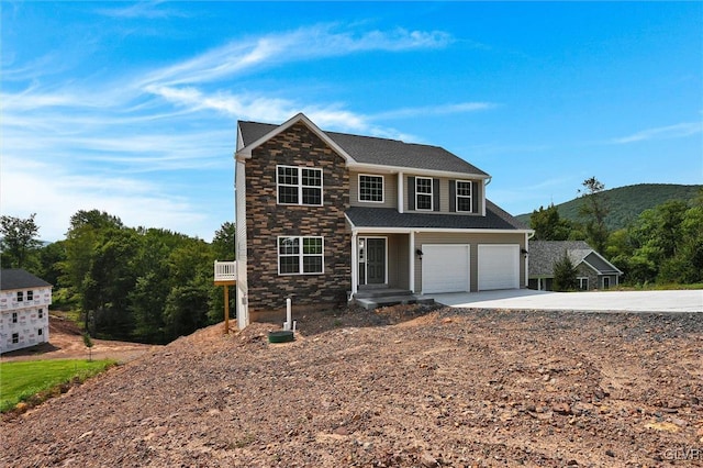 view of front of property featuring a garage