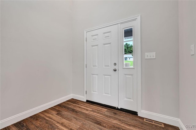 entrance foyer with dark hardwood / wood-style flooring