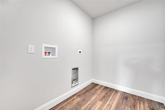 laundry area with washer hookup, electric dryer hookup, and wood-type flooring