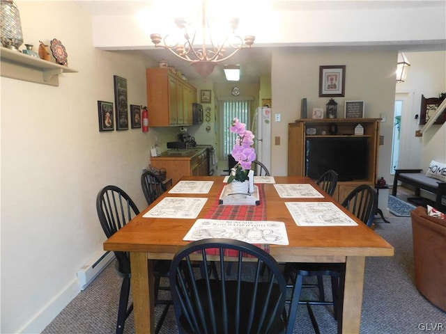 dining space with carpet, a baseboard radiator, and a notable chandelier