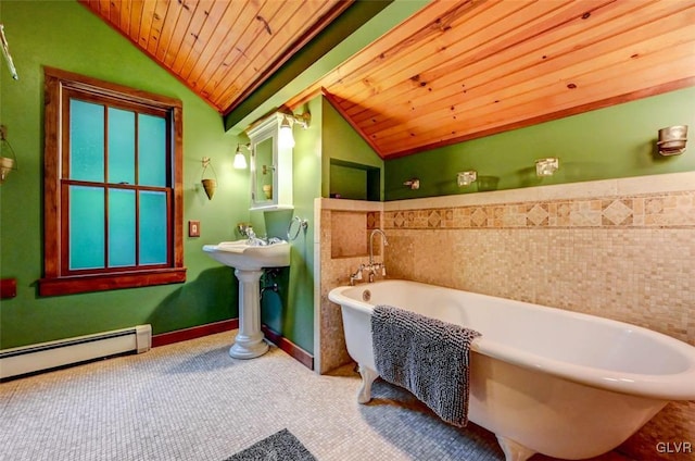 bathroom with a washtub, vaulted ceiling, baseboard heating, and wood ceiling