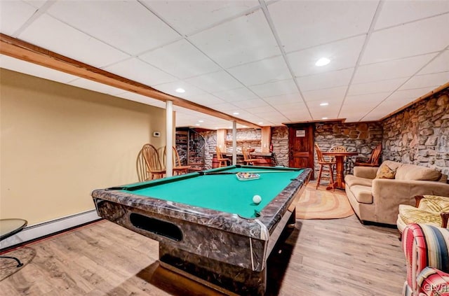 rec room with light hardwood / wood-style flooring, a baseboard radiator, a drop ceiling, and billiards