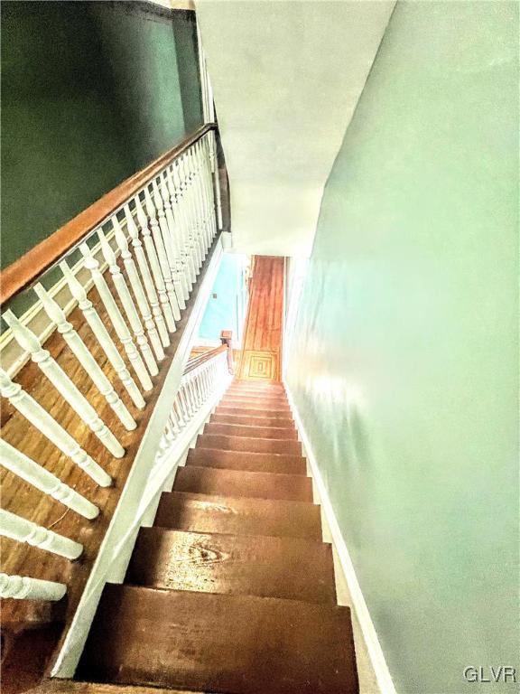 55 S Walnut St, Lansford Borough, PA 18232 - stairs featuring baseboards and wood finished floors