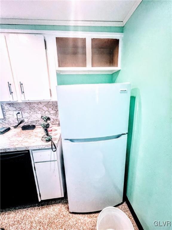 55 S Walnut St, Lansford Borough, PA 18232 - kitchen featuring white cabinets, freestanding refrigerator, dishwasher, tasteful backsplash, and crown molding