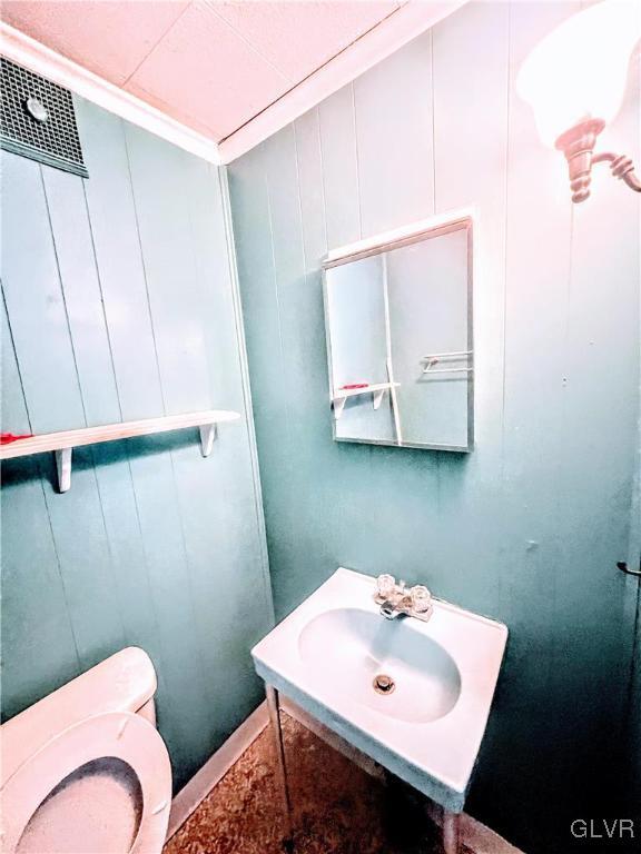 55 S Walnut St, Lansford Borough, PA 18232 - half bath featuring a sink and toilet