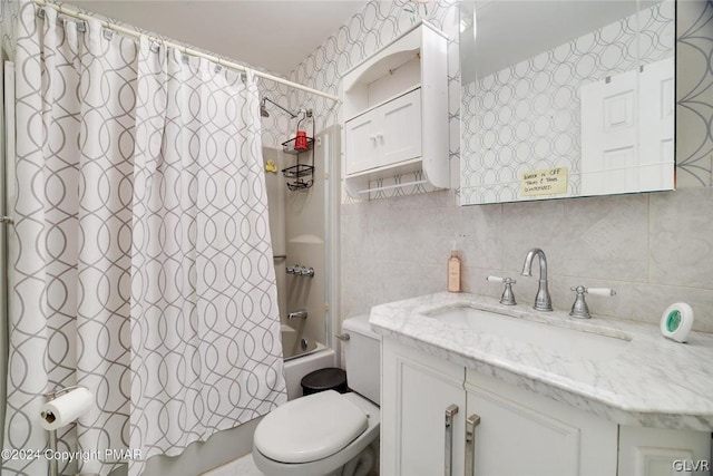 full bathroom featuring vanity, tile walls, shower / tub combo, and toilet