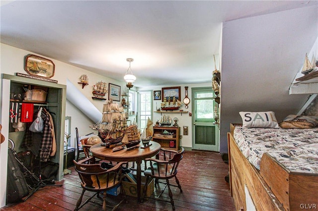 dining area with dark hardwood / wood-style floors