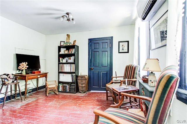 sitting room with a wall mounted AC