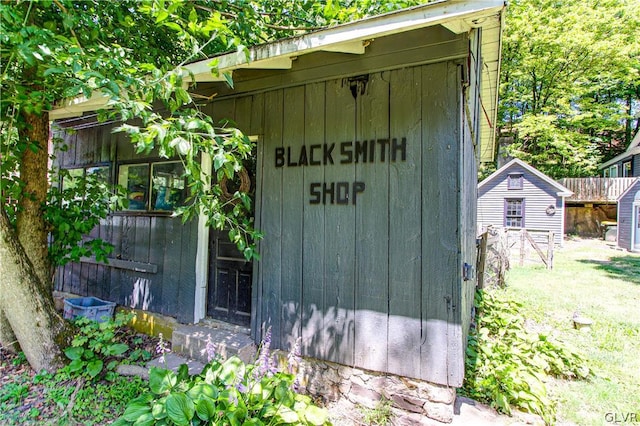 view of outdoor structure with a yard