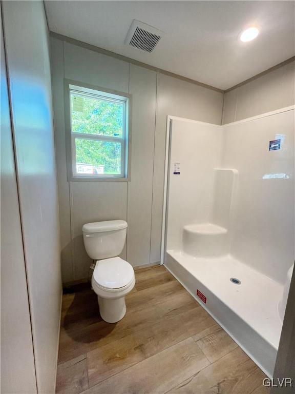 3444 Franklin Sq, Moore Twp, PA 18067 - bathroom with wood finished floors and a shower