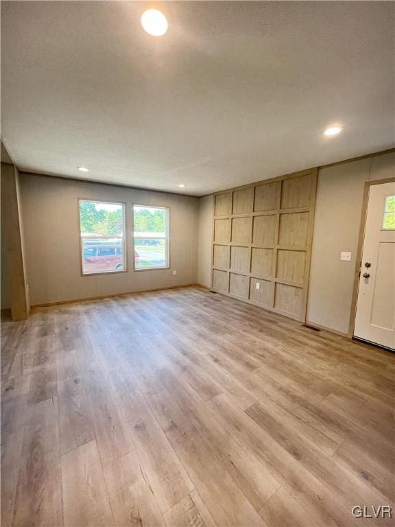 3444 Franklin Sq, Moore Twp, PA 18067 - unfurnished living room featuring light wood-style flooring and recessed lighting