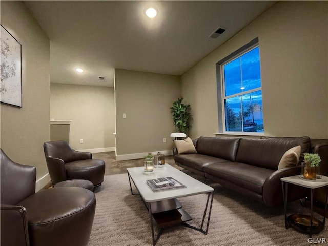 living room featuring carpet