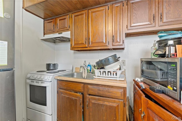 kitchen with appliances with stainless steel finishes and sink