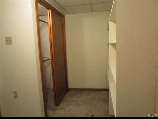 spacious closet featuring a paneled ceiling