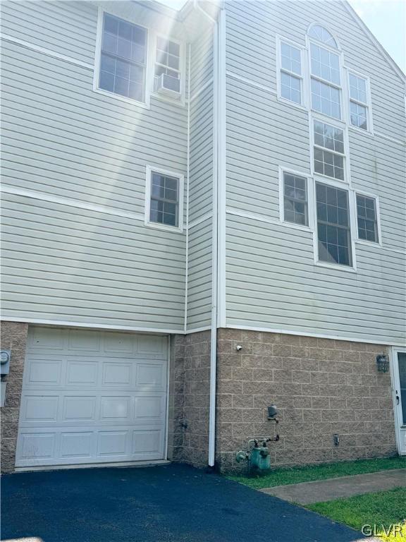 view of home's exterior featuring a garage