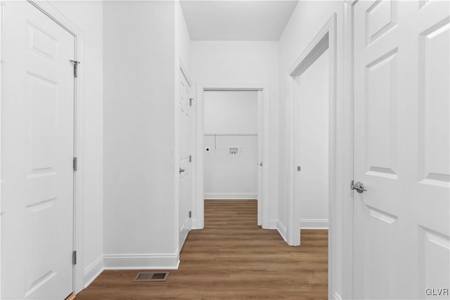 hallway featuring hardwood / wood-style floors