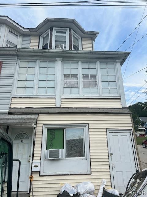 view of front of house with cooling unit