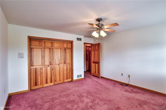 unfurnished bedroom featuring carpet, ceiling fan, and a closet