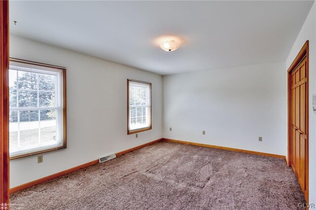 unfurnished bedroom featuring carpet floors