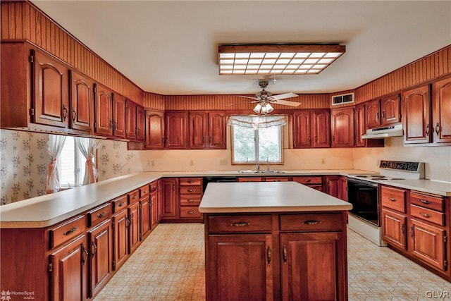 kitchen featuring light tile patterned floors, white range with electric stovetop, a wealth of natural light, and ceiling fan