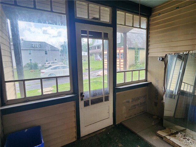 doorway to outside featuring a wealth of natural light