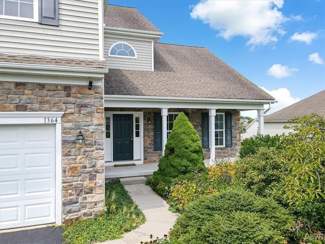 entrance to property with a garage