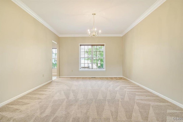 carpeted spare room with a notable chandelier and crown molding