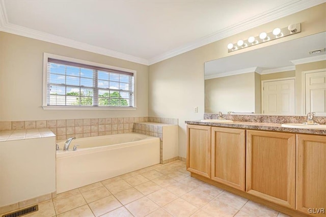 bathroom with a bath, double sink vanity, crown molding, and tile patterned flooring