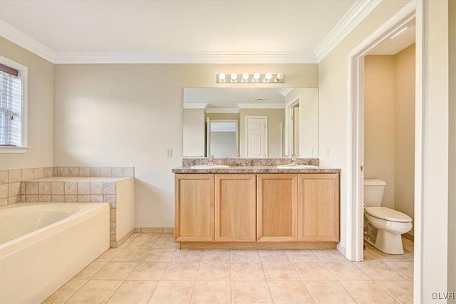 bathroom with ornamental molding, dual vanity, a tub to relax in, toilet, and tile patterned flooring