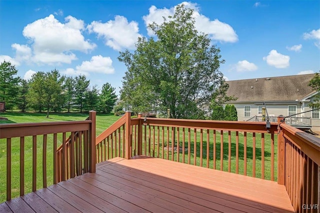 deck featuring a yard