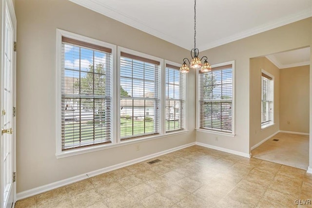 interior space with an inviting chandelier and ornamental molding