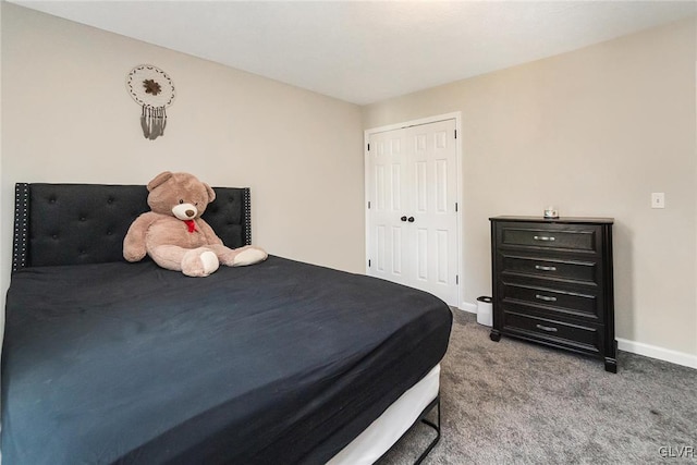 carpeted bedroom featuring a closet