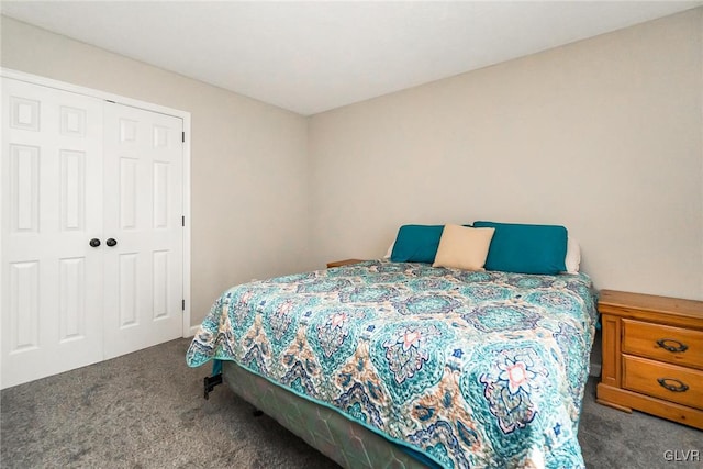 carpeted bedroom featuring a closet