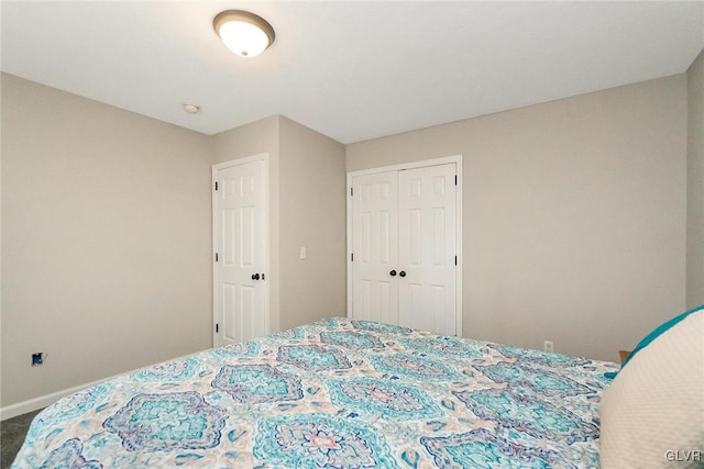 bedroom with a closet and carpet floors