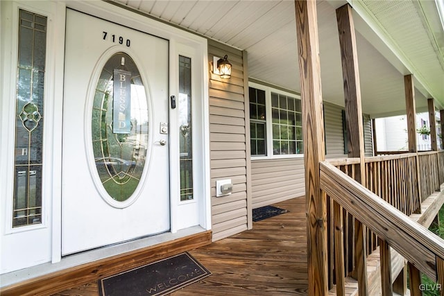 entrance to property with covered porch