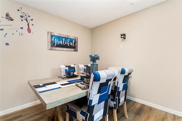 dining room featuring dark wood-type flooring