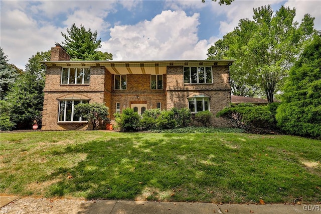 view of front of house with a front yard