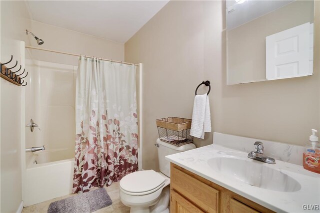 full bathroom featuring tile patterned flooring, vanity, toilet, and shower / bath combo