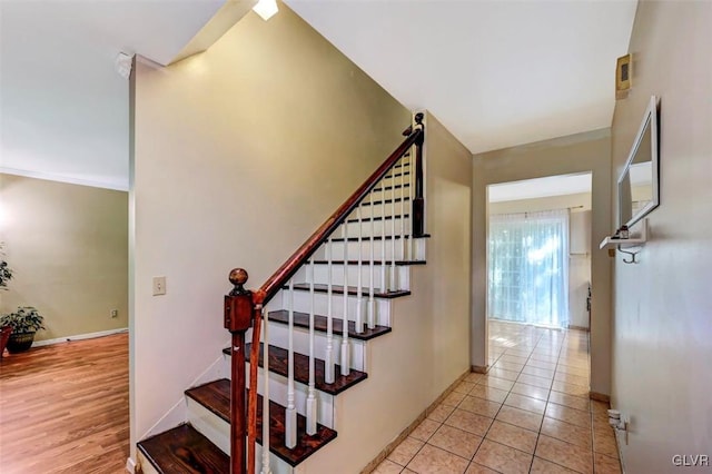 stairway with wood-type flooring