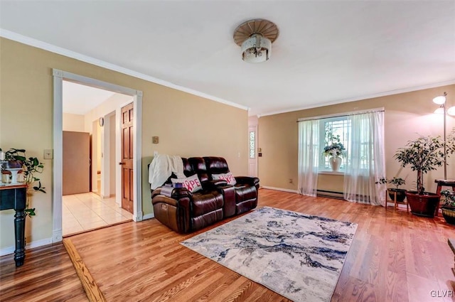 living room featuring wood-type flooring and ornamental molding