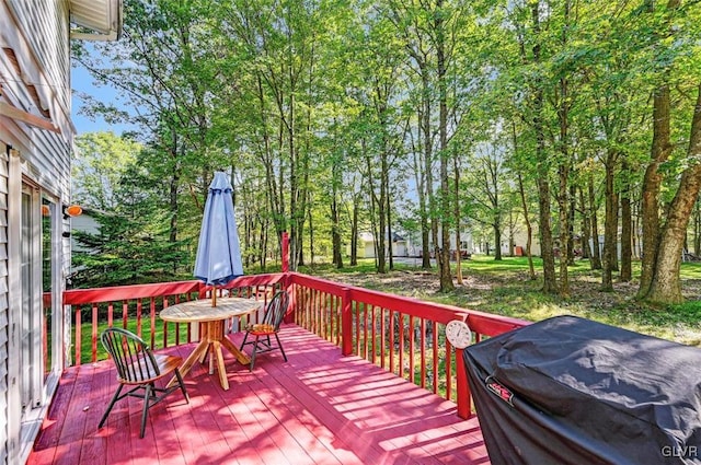 wooden terrace with grilling area