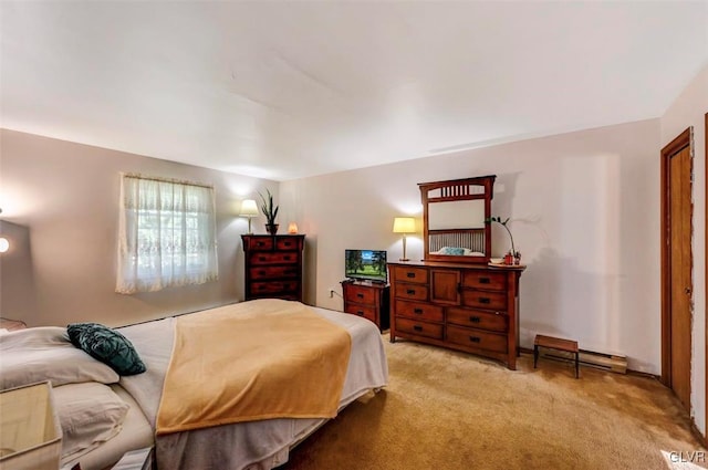 bedroom featuring light carpet