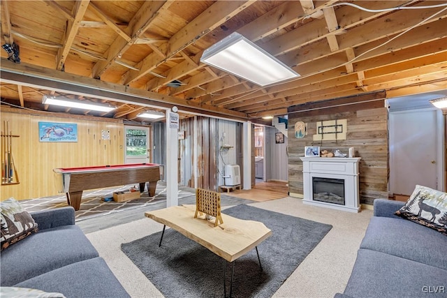 living room with billiards and wooden walls