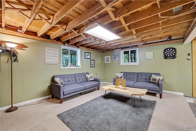 living room with carpet flooring and plenty of natural light