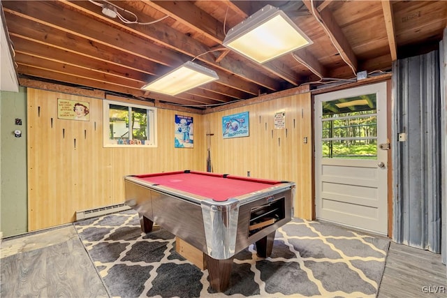 game room with wood walls, pool table, a baseboard radiator, and a healthy amount of sunlight