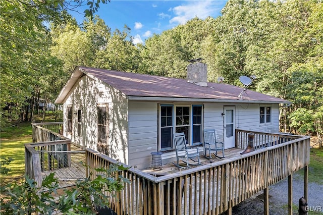 rear view of house with a deck